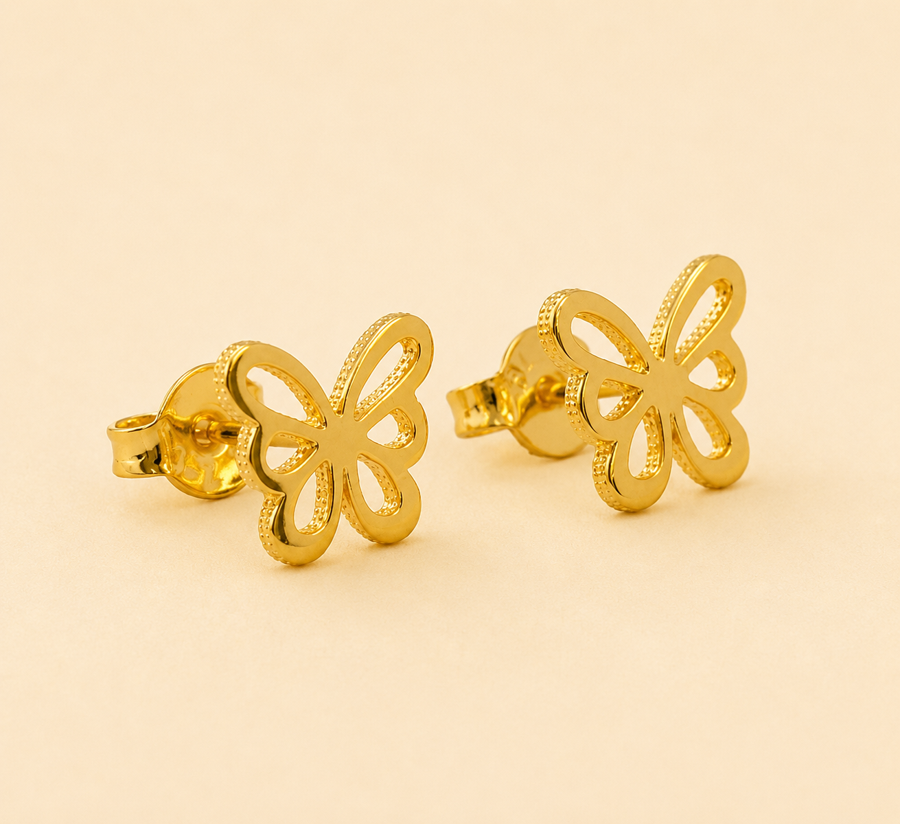 Aretes topo en oro mariposa